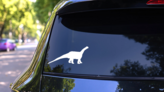 Cool Apatosaurus Dinosaur Sticker on a Rear Car Window (New) example