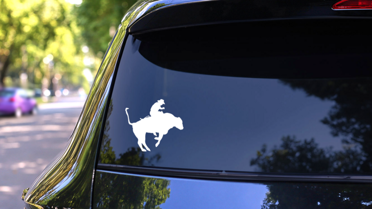 Cool Rodeo Cowboy Bull Rider Sticker on a Rear Car Window (New) example