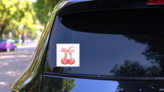 Coquette Striped Bow Sticker on a Rear Car Window (New) example