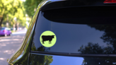 Cow Black Silhouette Illustration On Green Sticker on a Rear Car Window (New) example