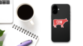 Cow Silhouette With Grunge Text Sticker on a Phone (New) example