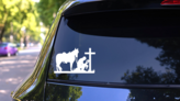Cowboy Resting And Reading The Bible Sticker on a Rear Car Window (New) example