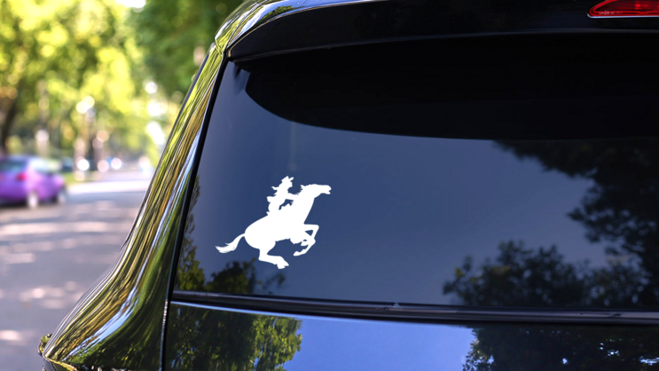 Cowboy Riding A Horse Galloping Sticker on a Rear Car Window (New) example