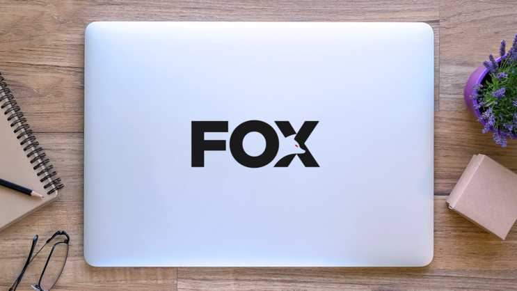 Creative FOX Text Sticker on a Laptop (New) example