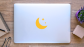 Crescent Moon Icon Sticker on a Laptop (New) example