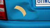 Curvy Band Aid Bandage Sticker on a Dented Car example