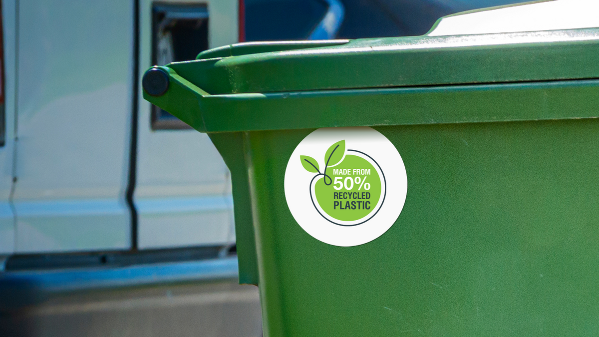 Custom Permanent Sticker on a Recycling Bin