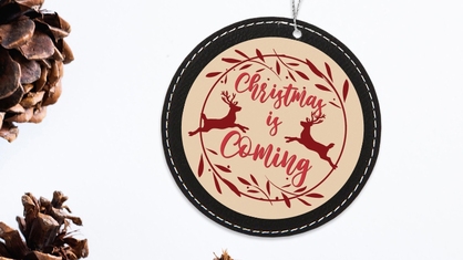 Custom round leather ornament by pine cone