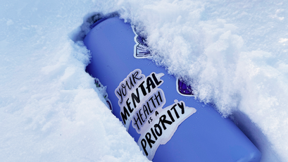 Custom Water bottle Sticker on Water Bottle in the Snow