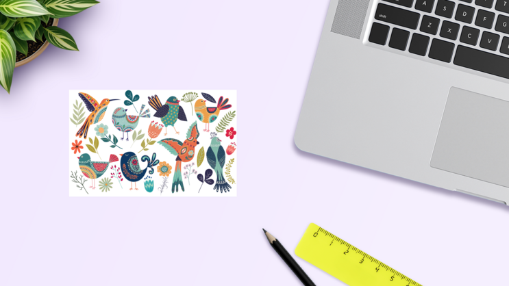 Cute Birds And Flowers Sticker Sheet on a Desk (New) example