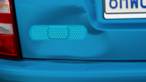 Cute Blue Band Aid Bandage Sticker on a Dented Car example