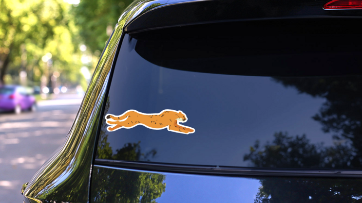 Cute Cartoon Cheetah Illustration Sticker on a Rear Car Window (New) example