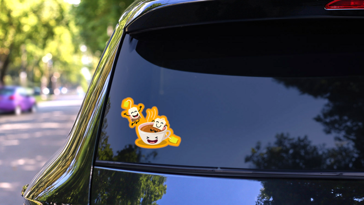 Cute Cartoon Cup Of Tea With Happy Tea Bags Sticker on a Rear Car Window (New) example
