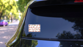Cute Dachshund Sticker Sheet on a Rear Car Window (New) example