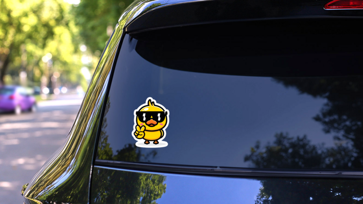 Cute Duck In Cool Style With Glasses Sticker on a Rear Car Window (New) example