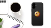 Cute Fangs Emoji Sticker on a Phone (New) example
