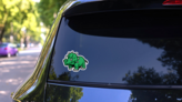 Cute Green Dinosaur on a Rear Car Window (New) example