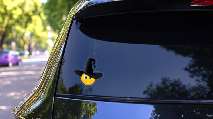 Cute Halloween Witch Hat Emoji Sticker on a Rear Car Window (New) example