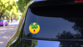 Cute Money Eyes Dollars Emoji Sticker on a Rear Car Window (New) example