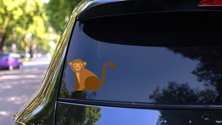 Cute Monkey Icon Sticker on a Rear Car Window (New) example