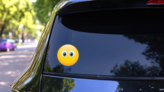Cute No Mouth Emoji Sticker on a Rear Car Window (New) example