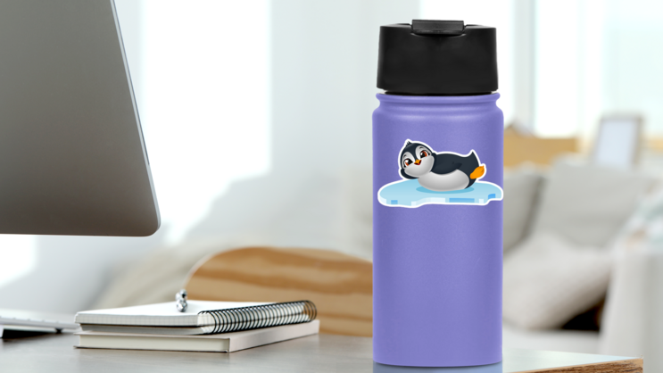 Cute Penguin Cartoon On Ice Float Sticker on a Water Bottle (New) example