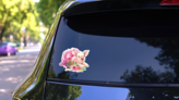 Cute Pig In Dress Watercolor Illustration Sticker on a Rear Car Window (New) example