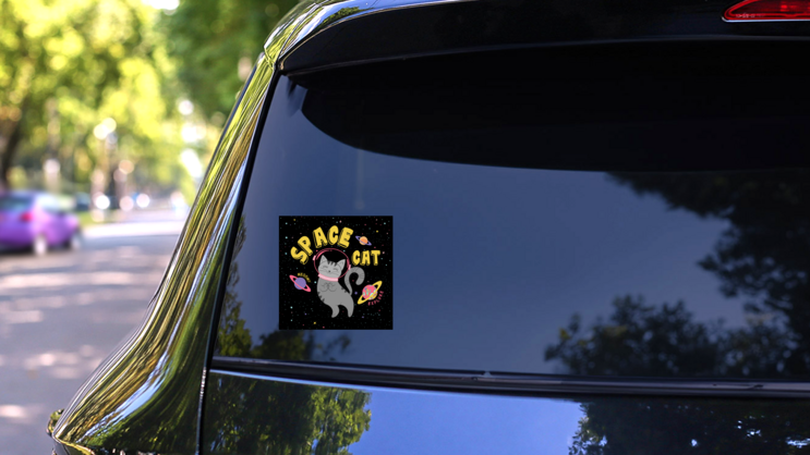 Cute Space Cat Graphic Sticker on a Rear Car Window (New) example