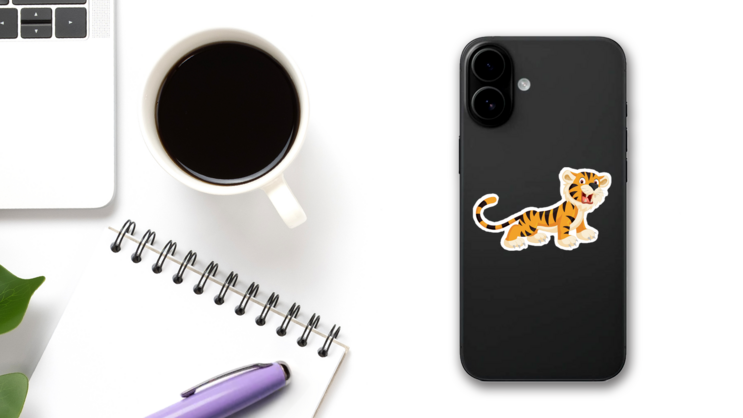 Cute Tiger Cub Roaring Sticker on a Phone (New) example