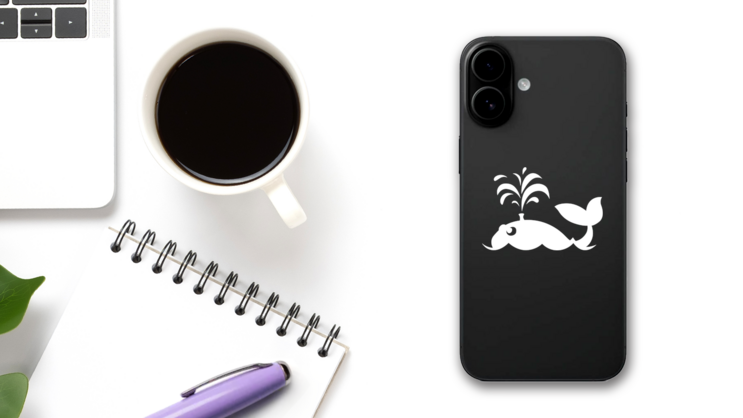 Cute Whale Blowing Out Water Sticker on a Phone (New) example