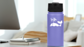 Cute Whale Blowing Out Water Sticker on a Water Bottle (New) example