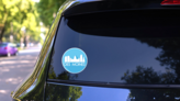 Des Moines Iowa Blue Circle Sticker on a Rear Car Window (New) example