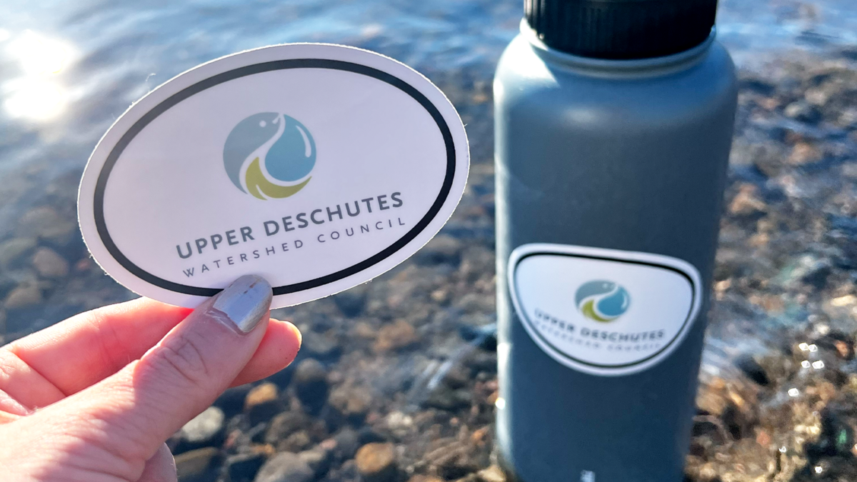 Custom Charity Oval Stickers for Upper Deschutes Watershed Council Applied to a Water Bottle