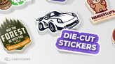 A collection of die cut stickers on a table.