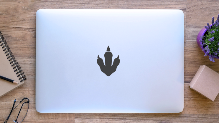 Dinosaur Foot Print Sticker on a Laptop (New) example