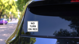 Do Not Drive On Tracks Sticker on a Rear Car Window (New) example