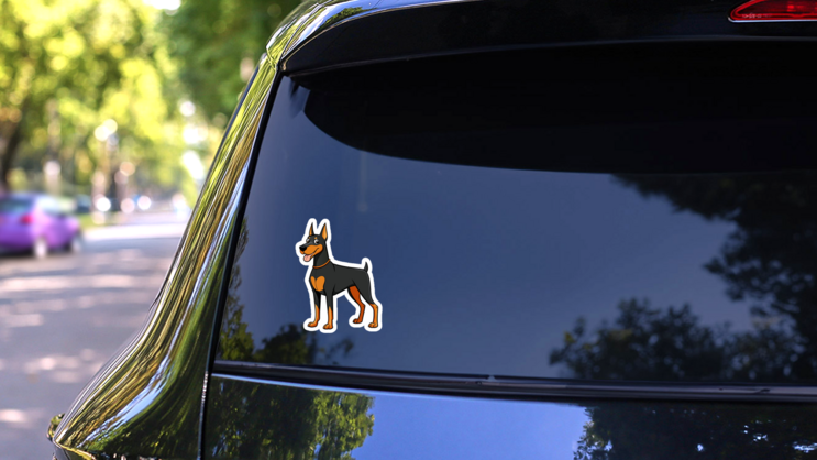 Doberman Cartoon Silly Sticker on a Rear Car Window (New) example