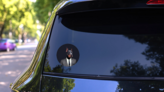 Doberman In Suit Sticker on a Rear Car Window (New) example