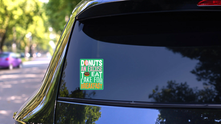 Donuts: An Excuse To Eat Cake For Breakfast Sticker on a Rear Car Window (New) example