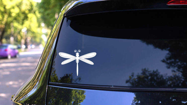 Dragonfly With Swirled Antennas Sticker on a Rear Car Window (New) example