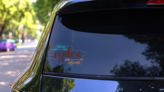 Dream Explore Discover Sticker on a Rear Car Window (New) example