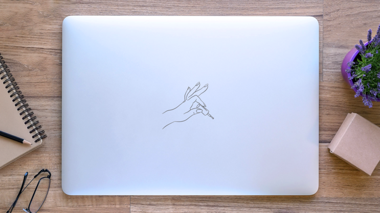 Elegant Hand Holding Nail Polish Brush Sticker on a Laptop (New) example