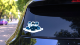 Emblem Of Rescue Team Sticker on a Rear Car Window (New) example