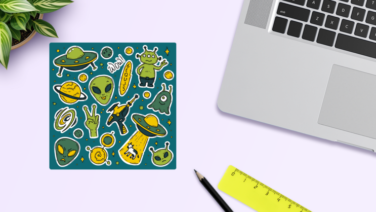 Everything Aliens Sticker Sheet on a Desk (New) example