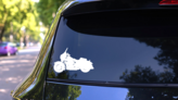 Exciting Motorcycle Sticker on a Rear Car Window (New) example