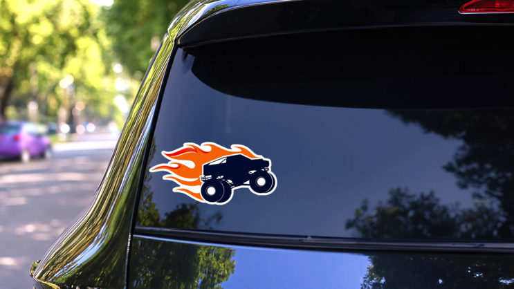 Extreme Monster Truck With Flames Sticker on a Rear Car Window (New) example