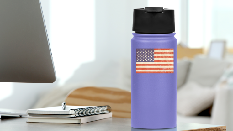 Faded Vintage American Flag Sticker on a Water Bottle (New) example