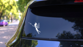 Fairy With Detailed Wings Casting Magic Sticker on a Rear Car Window (New) example