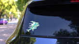 Fast Sprint Runner Sticker on a Rear Car Window (New) example