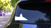 Fat Lighthouse Sticker on a Rear Car Window (New) example